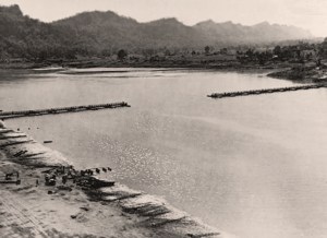 A view of the 1,100ft bailey bridge across the Chindwin River as it nears completion, less than 12 hours after the 14th Army captured Kalewa, 2 December 1944